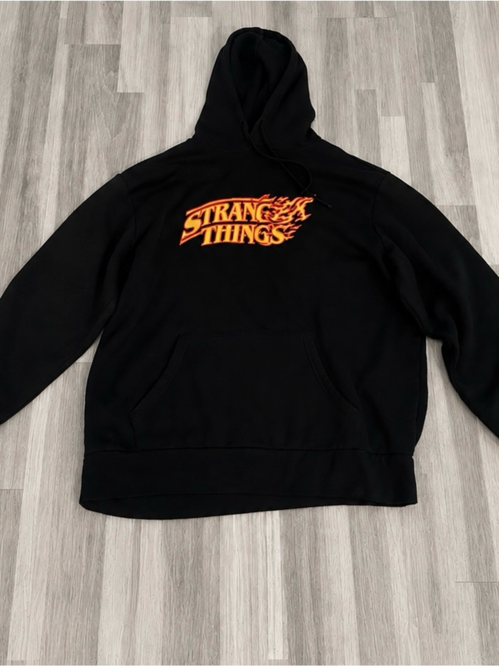 Netflix Stranger Things Black Hoodie with Orange Flame Logo